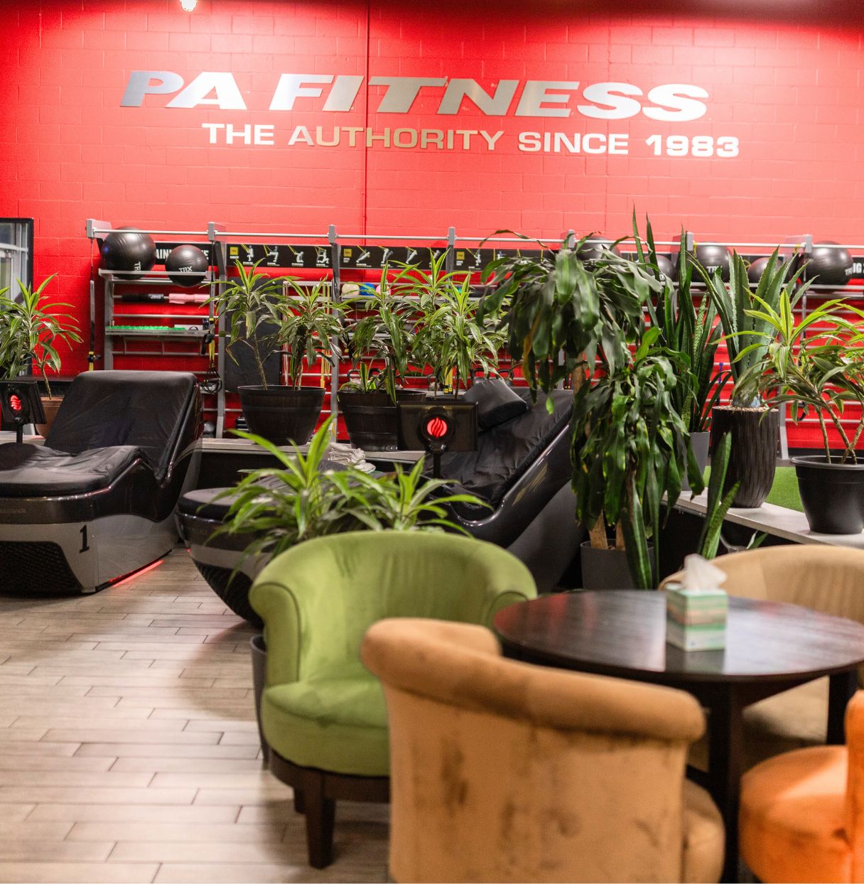 PA Fitness Queensgate gym recovery lounge complete with massage chairs and a relaxing environment to cool down from a workout.